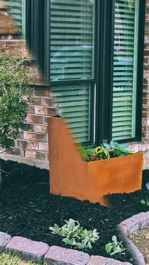 Rusty planters rule! #gneegarden #planter #landscape