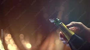 Champagne explosion. Sparkling wine popping, opening champagne bottle closeup. Slow motion. 4K UHD video footage. 3840X2160