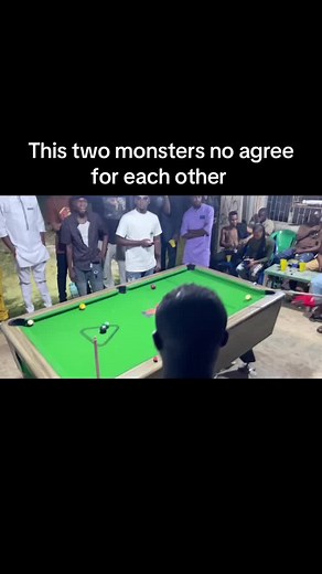 Intense Snooker Match: Two Skilled Players Face Off