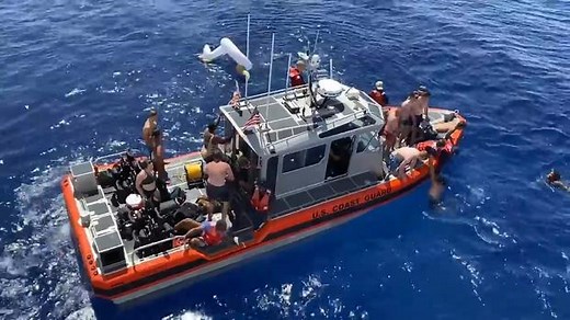 Coast Guard Watchstander Shoots at Shark Who Crashes Swim Call