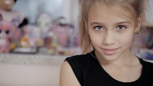 Pretty Smiling Girl Sitting On Bed Stock Footage Video (100% Royalty-free) 1028343098 | Shutterstock