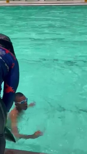 Fun Diving Moments in a Colorful Pool