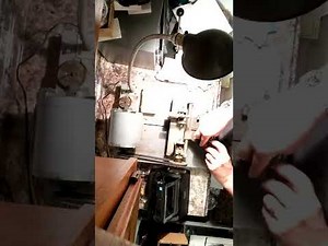 Steve's locksmith cutting safe deposit box key on Foley Belsaw 200 key machine