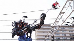 Japan's giant humanoid robot fixes hard-to-reach railway wires