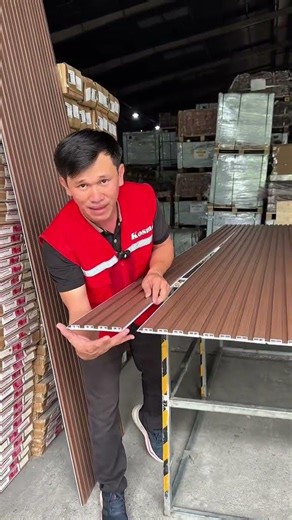 Brown wood grain wavy panel, specialized for interior wall and ceiling cladding.