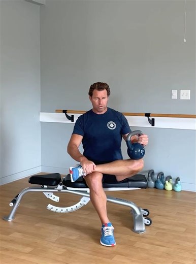 Seated Figure Four Stretch with Kettlebell