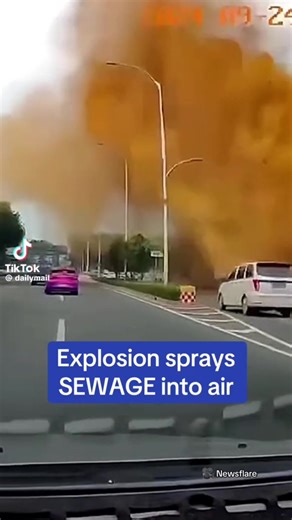 A 💩 sewage pipeline EXPLODED in China, sending large amounts of yellow sewage spraying into the air and landing on the windshields of moving cars. A nearby excavator was overturned, and the rear window of a car was shattered by the force of the incident. Thankfully no one was injured in the blast. Newsflare credit tiktok @Daily Mail