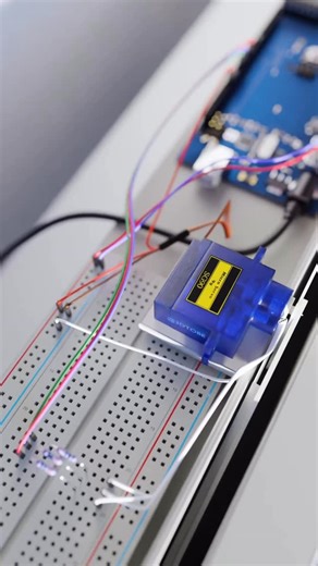 TOBE • on Instagram: "What’s a servo motor? 🦾 A servo is a motor that rotates to a specific angle and holds that position. Unlike a regular DC motor that just spins, a servo uses feedback to move precisely where you tell it. In this build, I’m using an SG90 hobby servo. It rotates roughly from 0° to 180°+ depending on calibration and pulse range. The servo moves a “sun” model through the day: 0° = sunrise 180° = sunset The angle follows the time of day, and the RGB LED shifts color based on the