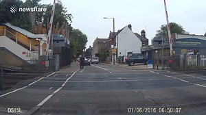 203K views · 384 reactions | Shocking moment man runs across level crossing with pushchair | Newsflare | Facebook