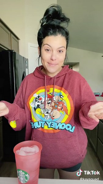 Playful Starbucks Cup Trick in Casual Kitchen