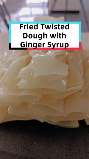 4.9K views · 38 reactions | 數Fried twisted dough with ginger syrup, a traditional snack in #Beijing, has a crispy texture and a sweet taste. Click this video to take a look at how to cook it! #ChinaFlavors | Discover China | Facebook