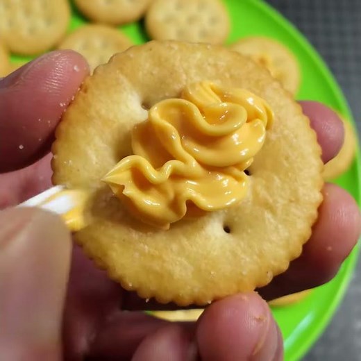 eat Cheese Puff Balls with Ritz Crackers