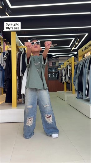 Stylish Kid Looks: Oversized Tees and Distressed Denim