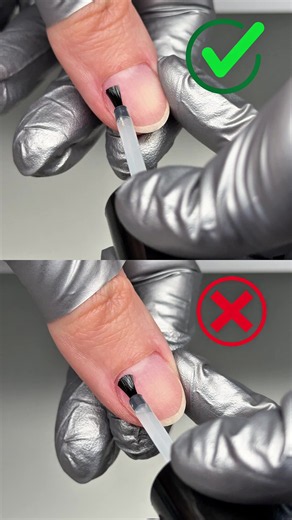 An acid-free primer is a great tool for improving adhesion between the natural nail and the product. However, when applied incorrectly, it can also become one of the main causes of lifting. Primer should be applied in thin, even strokes without layering the product on top of itself. Always leave a small gap around the cuticle area and a slight distance from the sidewalls. After application, the nail should have only a very thin, slightly shiny, tacky film. Applying too much primer has the opposi