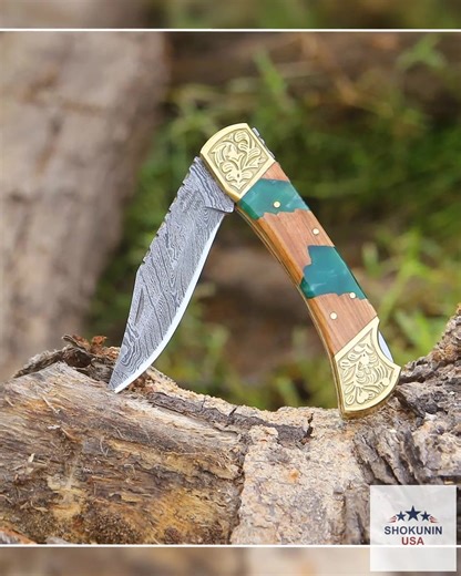 Looking for a gift that combines craftsmanship with timeless style? 🎁✨ Meet the Flashblade Handmade Damascus EDC Pocket Knife—a timeless treasure designed for those who appreciate artistry in every detail. With its meticulously crafted Olive Wood Handle and durable Leather Sheath, this knife is not just a tool—it's an heirloom. Perfect for the outdoorsman or the everyday enthusiast, it embodies rugged elegance and unparalleled quality. 🌲🔪 Don’t miss the chance to give a gift that speaks volum