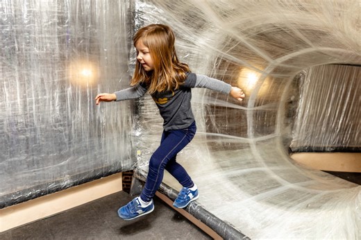 Indoor art installation TAPESCAPE is back at the Children's Museum: Kids and grownups can slide, crawl and explore.