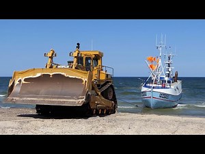 CAT D10N Dozer Pulling Up Fishing Boats to the Beach at Thorup Strand