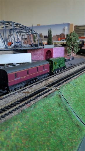 OO Hornby 4-6-2 BR 34066 "Spitfire" with a passengers train, 0-6-0 BR class 08 with a goods train,