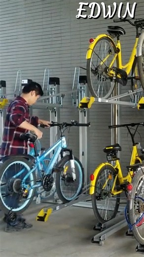 Bike Rack With Vertical Lift This rack design is primarily used for high-density, space-saving bicycle storage in places like apartments, offices, and transport hubs. | EDWIN - TECH