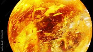 Amber. Beautiful colored pieces of amber. Amber texture. Red-yellow amber with bubbles, waves, divorces and color transitions. Natural mineral Sunstone. Material for jewelers. Crystal.