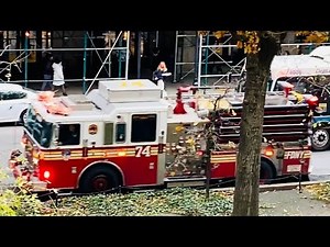 FDNY ENGINE 74 RESPONDING ON BROADWAY ON THE UPPER WEST SIDE AREA OF MANHATTAN IN NEW YORK CITY.