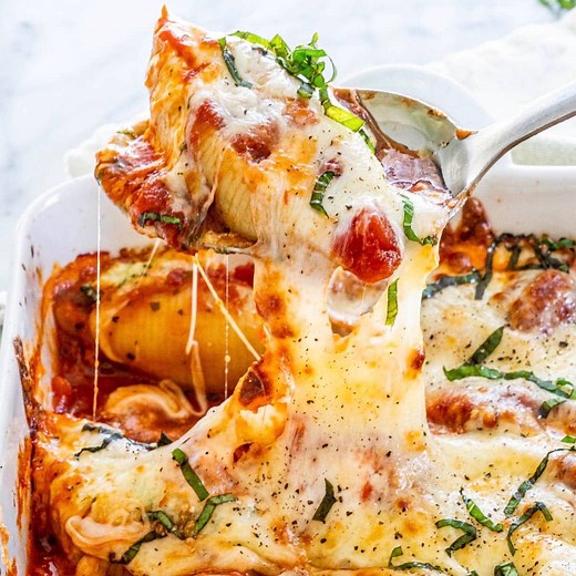 51K views · 121 reactions | These easy Stuffed Shells are perfect to throw together on a weeknight and impressive enough to serve guests. They’re saucy, oh-so-cheesy, and loaded with a ricotta, spinach, and parmesan filling. GET THE RECIPE: https://www.jocooks.com/recipes/cheese-and-spinach-stuffed-jumbo-shells/ | JoCooks | Facebook