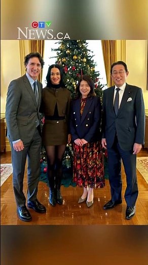 Justin Trudeau and Katy Perry pose with former Japanese PM