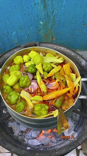 Delicious Vegetable Cooking in Charcoal Pot