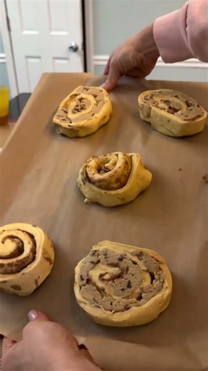 1 can cinnamon rolls 1 pack cookie dough Unroll cinnamon rolls, press cookie dough in a layer on