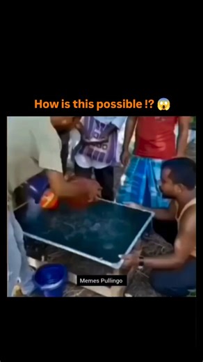 Lucky Clips on Instagram: "street performer executing a classic three-shell game, rapidly shuffling red and blue bowls to hide a white ball while a crowd bets, creating optical confusion through misdirection. The clip has exploded to over 2 million views in under 24 hours, with 112 replies mostly decoding the illusion—such as a jump cut at 0:14 seconds and duplicate balls concealed by pressing bowls against the table. Psychological research on change blindness, like Simons and Rensink's 2005 stu