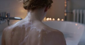 clip-25018622-beautiful-woman-enjoying-relaxing-bubble-bath