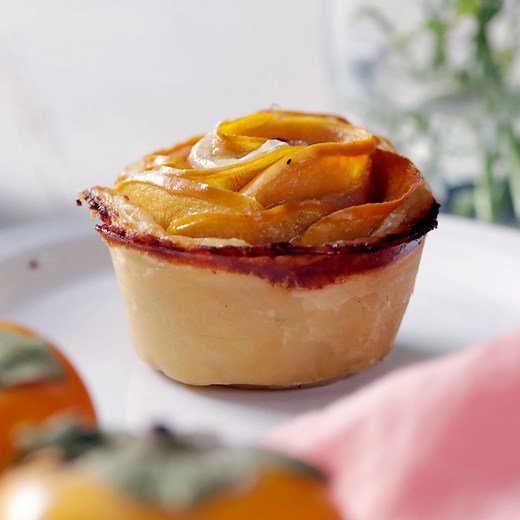 Happiness is sweet persimmons wrapped with brie and ham in a buttery puffed pastry. | Tastemade