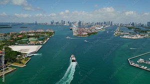 Cargo ship with container in Miami, aerial view. Freight container on cargo vessel. Cargo ship vessel entering port. Container ship. Export and import. Cargo business 4k.