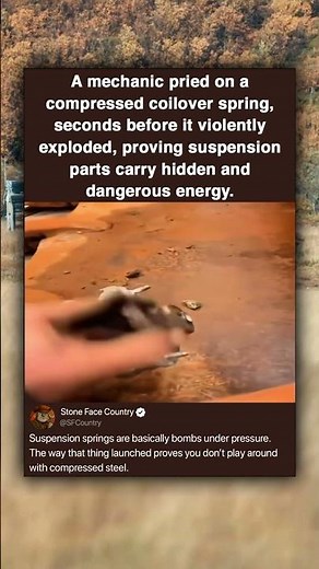 A mechanic pried on a compressed coilover spring, seconds before it exploded, proving suspension