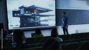 Young University Professor Explaining the Principles of Modern Architecture to a Group of Diverse Multiethnic Students in a Dark Auditorium. Teacher Showing a Housing Project on Two Big Screens