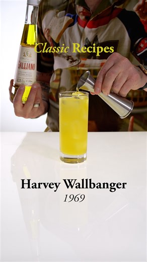This is a Cocktail Book on Instagram: "Be smarter than your bartender—guaranteed. Link in bio ✦ Harvey Wallbanger Donato “Duke” Antone, McKesson Imports, 1969 45 ml vodka 120 ml orange juice 15 ml Galliano L’Autentico (float) build/collins/cube ice/float/picked orange wheel wrapped around a cocktail cherry ✦ An excerpt from Chapter IX of THIS IS A COCKTAIL BOOK: “An insanely popular cocktail throughout the 1970s due to one of the most successful marketing campaigns in booze history. If you were 