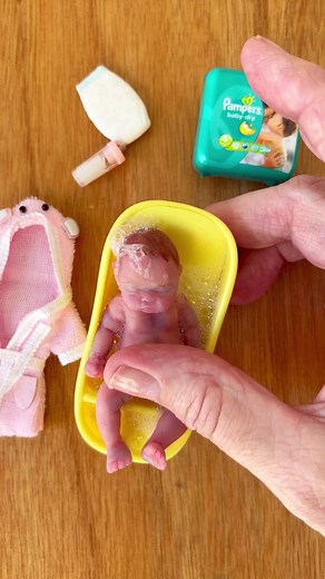 20M views · 353K reactions | Bath or shower? The miniature silicone baby doll got a bath and powered. I ❤️ baths - but I always seem to be in a hurry and take a shower. How about you? #tinythings #miniatures #miniaturebaby #miniatureworld | Grandma Gets Real | Facebook