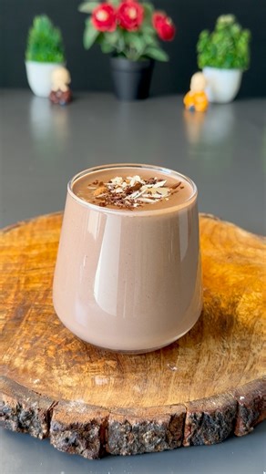 Detailed Recipe Ingredients • Makhana (fox nuts): 1 handful (about ½ cup) • Almonds (badaam): 6–7 pieces • Cashews: 5–6 pieces • Dates: 3 (seedless) • Cocoa powder: 1 tablespoon • Warm milk: ½ cup (to soak the mixture) • Chocolate: 2–3 small pieces (dark or milk, as per preference) • Milk: 1 glass (approx. 250 ml) • Extra chocolate: 1–2 pieces (for melting into the boil) ⸻ Method Step 1: Prepare the Nut & Cocoa Base 1. Take a medium bowl and add: • 1 handful of makhana • Almonds, cashews • 3 dat