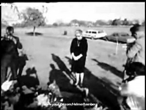 November 25, 1964 - Lee Harvey Oswald's mother Marguerite Oswald at his grave at Rose Hill Cemetery