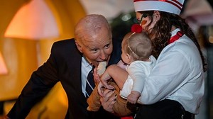 ‘No child was safe’: ‘Cringe’ Joe Biden sparks furore with baby biting antics at Halloween event