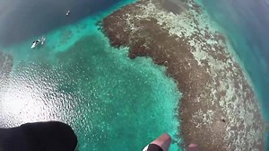 Skydiving Into The Blue Hole - Belize By: @yogaFLIGHT | Lou La Vie Society