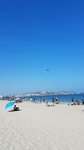 Watching the lucky ones arrive! At Playa den Bossa beach 😀📷🏖🏝🛬 | The IBIZA Explorer