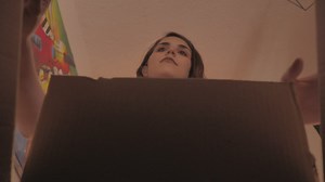 Woman opens a box - Free Stock Video