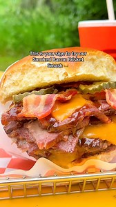 Meet your new obsession: the Smoked Bacon Brisket Smash! 🤤🔥 Juicy Certified Angus Beef® meets hand-trimmed, 14-hour pit-smoked brisket, and it’s all layered with aged cheddar and crispy bacon. Finished with BBQ sauce and dill pickles on a buttery roll, this burger is a must-try! 🍔🥓 ✅ Save this post so you don’t forget to try it! #SummerofSmash | Smashburger