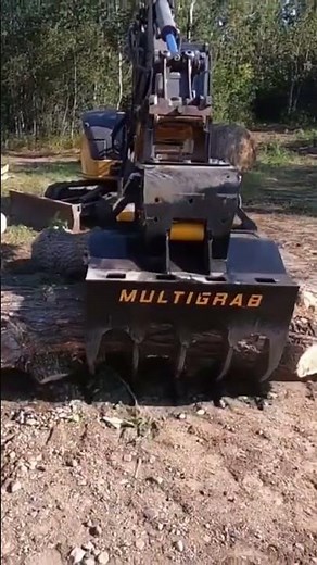 TMK Multigrab S grabbing logs on mini excavator. #tmkmachinery #excavatorattachments