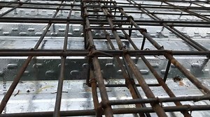 Industrial background. Rebar texture. Rusty rebar for concrete pouring. Steel reinforcement bars. Construction rebar steel work reinforcement. Closeup of Steel rebars.