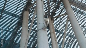 Rotation view of the video surveillance in the airport terminal. Being secured, safe place. Modern technologies, dangerous world. Safety system.