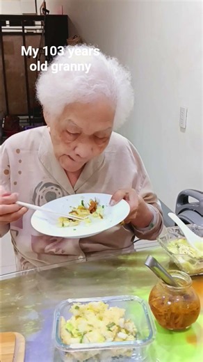 Granny enjoying eating.