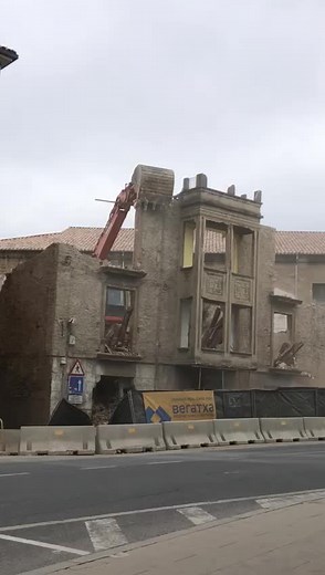 Demolition of Old Multi-Story Building in Action