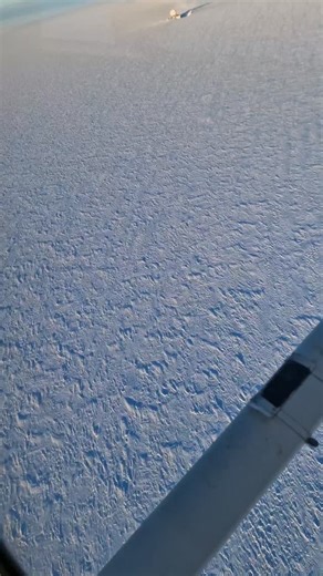 Flying by Dye 2, abandoned radar station from the cold war. Floating 7000 feet above the ground! | Sam Rutherford